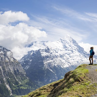 A woman hiking in the Swiss Alps