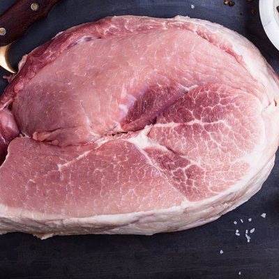 Raw organic boneless pork ham ready to cook