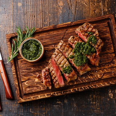 Sliced Sirloin steak with chimichurri sauce