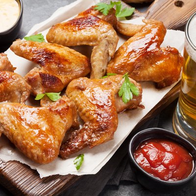 Hot chicken wings and draft beer