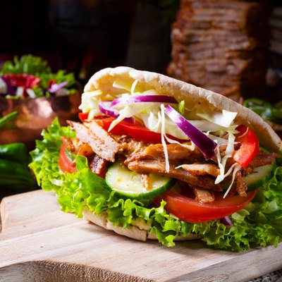 Crunchy pita with grilled gyro meat, various vegetables and garlic sauce for chicken breast recipes