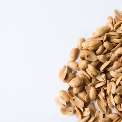 Directly Above Shot Of Peanuts On White Background