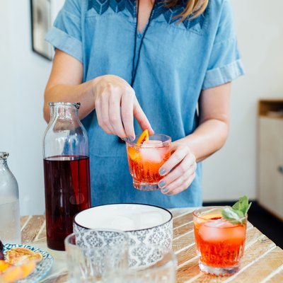 Woman preparing cocktail