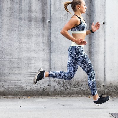 Female Athlete Running Outdoors