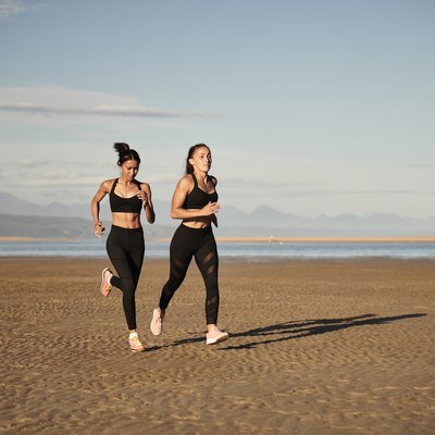 Females running on beach
