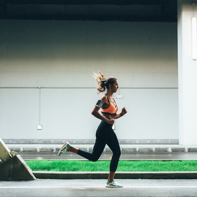 Sportswoman running in the city