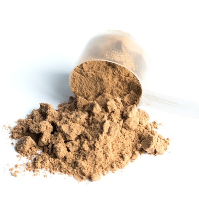 chocolate whey powder isolated on white background