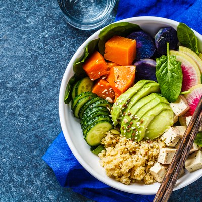 vegan quinoa salad with tofu, avocado and vegetables