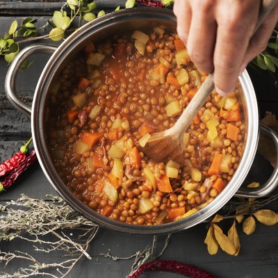 How to thicken stew in slow cooker man preparing a vegetarian lentil stew