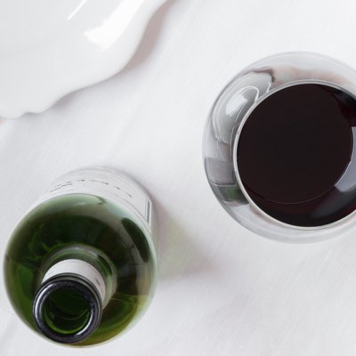 Directly Above Shot Of Red Wine With Bottle On Table
