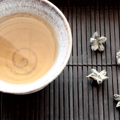 Teacup and white tea shaped into flowers