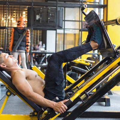 Man building lower-body muscles during leg-day workout