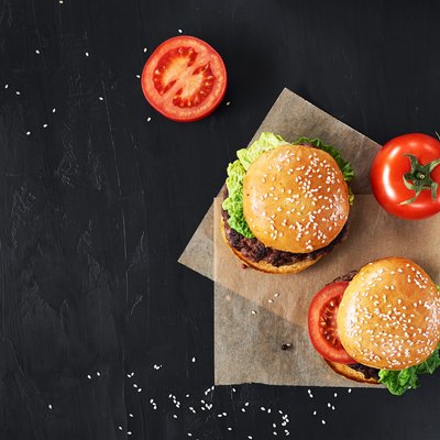 Craft beef burgers with vegetables.