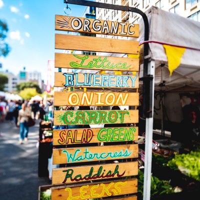 Signs for vegetables and greens for Sale