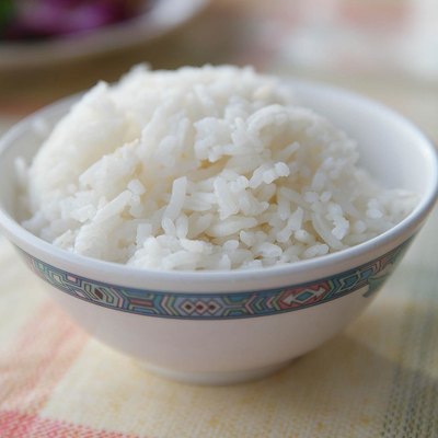 Steamed Rice Served In Bowl On Table