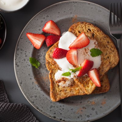 french toasts with yogurt and strawberries for breakfast