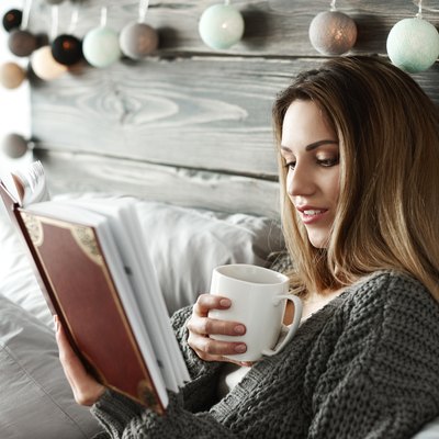 Woman drinking apple cider vinegar before bed