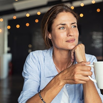 Woman drinking Mangosteen Tea