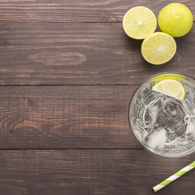 Fresh soda, lime on a wooden background