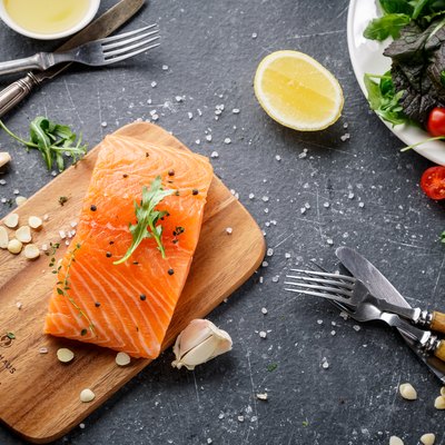 Raw salmon steak on the table