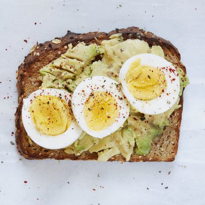 Toasted bread with avocado and hard boiled egg