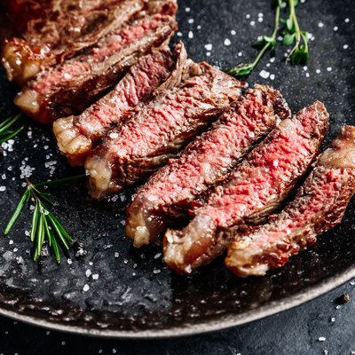 New York Striploin steak medium rare with rosemary top view