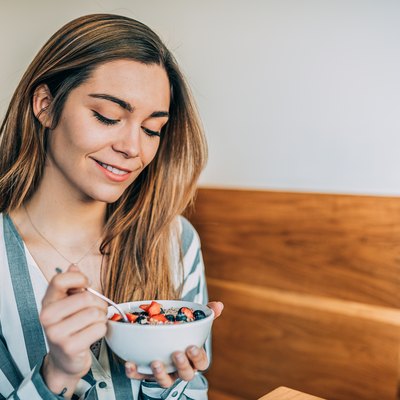 Vegan yogurt dairy free yogurt plant based woman eating