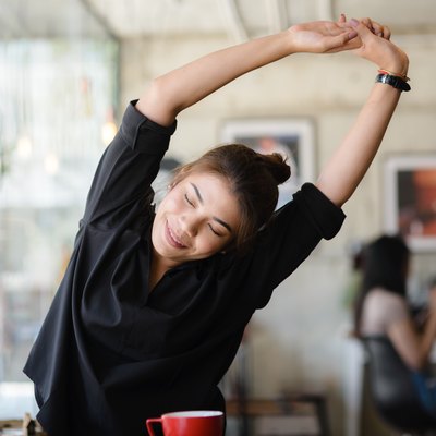 Beautiful Asian woman massage herself to protect an office syndrome, work, health lifestyle concept.