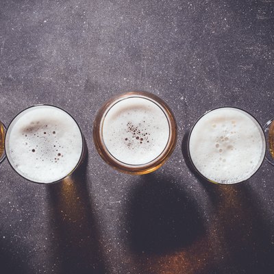 Beer glasses on dark table