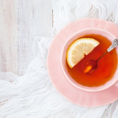 Cup of black tea with lemon