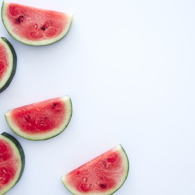 Sweet watermelon slices on white background
