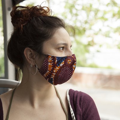New normal after coronavirus pandemic woman with trendy mask.
