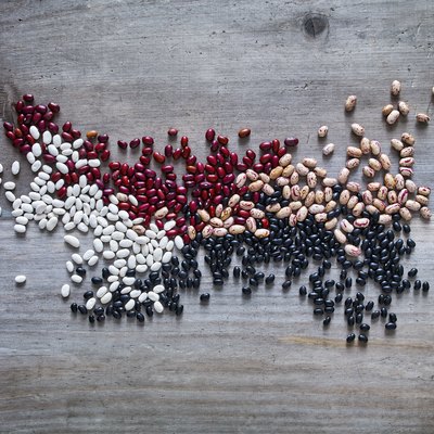 Beans on wooden background