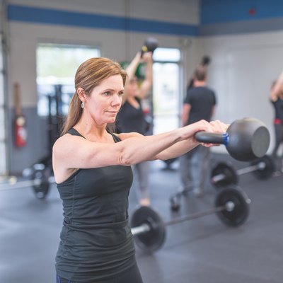 Woman doing a superset HIIT workout for beginners