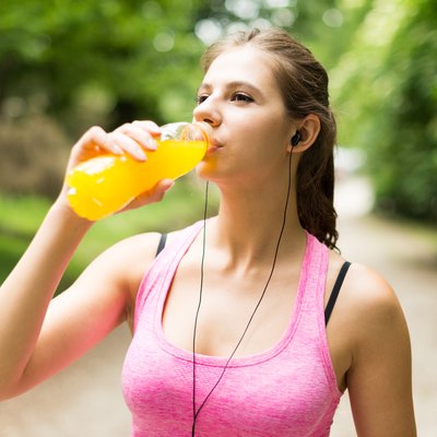 Woman drinking after sport