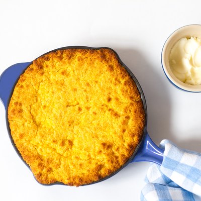Fresh Skillet Cornbread with Butter (Close-Up); White Background