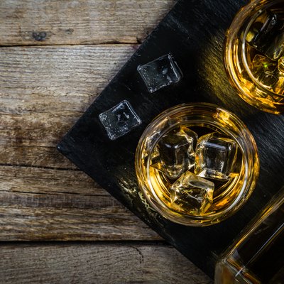 Whiskey with ice in glasses