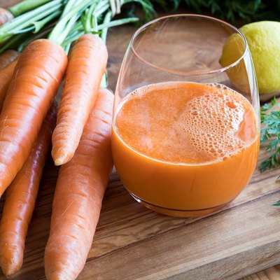 Carrot juice with fresh carrots