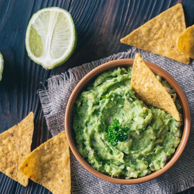 Bowl of guacamole with tortilla chips