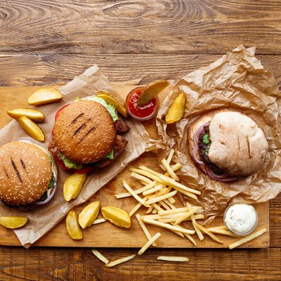 Fast food take away top view. Hamburger, hotdog and fries