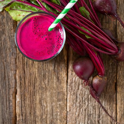 beetroot juice on wooden surface