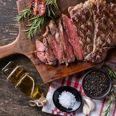 High Angle View Of Meat On Cutting Board