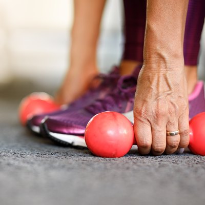 Woman using dumbbells