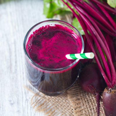 beetroot juice on wooden surface