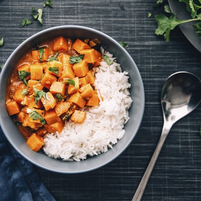 Bowl of sweetpotato ragout served with rice