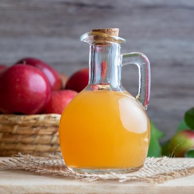 A bottle of raw unfiltered apple cider vinegar