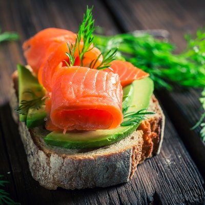 Healthy sandwich with avocado, dill and salmon