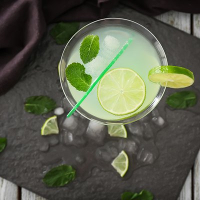 Fresh summer cocktail in glass on slate plate