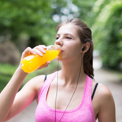 Woman drinking after sport