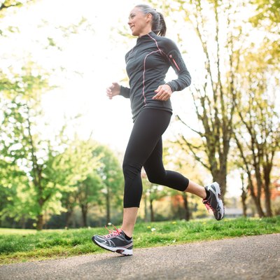 Mature Woman Jogging Outdoors